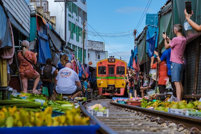 Amphawa Floating Market & Maeklong Railway Train Market Tour - Amphawa Floating Market, great food, smaller boats, and a canal-side reality check