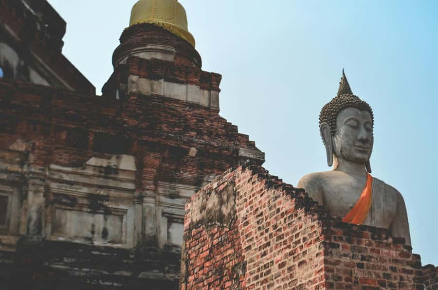 Ayutthaya: Sunset Bike Tour and Scenic Boat Ride - Wat Ratchaburana and Wat Phra Ram ruins after the light turns