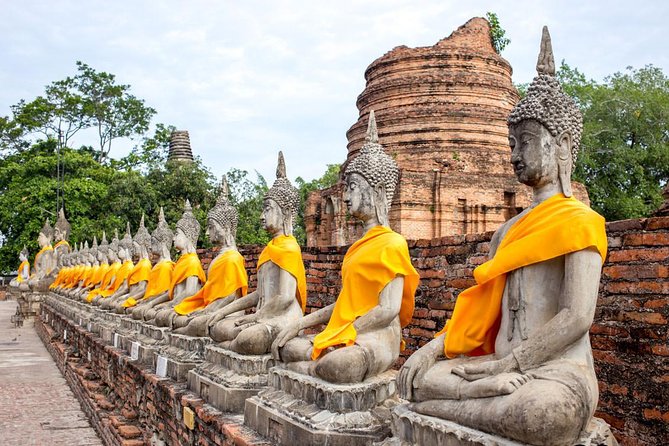 Ayutthaya Sunset Tour: Iconic Temples & Scenic River Boat Ride - Wat Yai Chai Mongkhon: chedi drama, reclining Buddha, and garden calm
