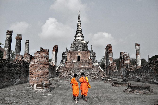 Ayutthaya Sunset Tour: Iconic Temples & Scenic River Boat Ride - Wat Chaiwatthanaram: riverside prang symmetry and sunset energy