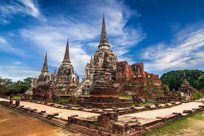 Ayutthaya Temples Tour from Bangkok with Grand Pearl River Cruise - Wihan Phra Mongkhon Bophit: A Bronze Buddha Story in Stone