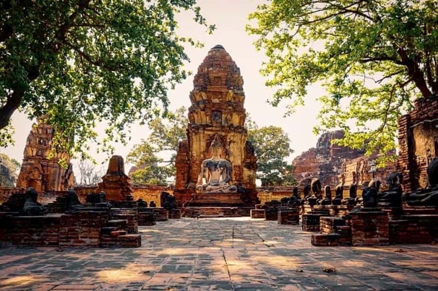 Bangkok: Ayutthaya VIP Day Trip with Boat Ride & Guide - River boat ride and evening elephant bathing in soft light