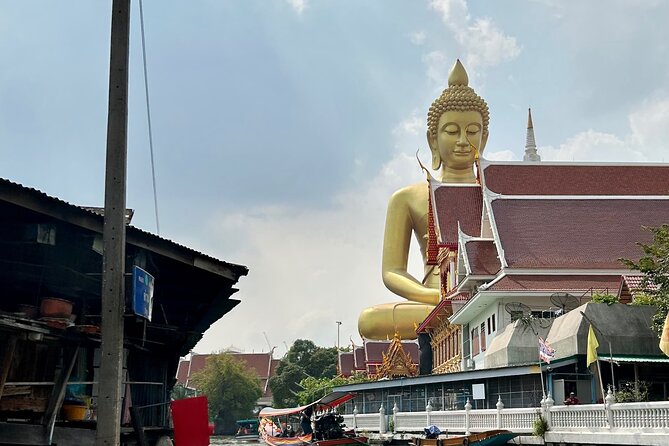 Bangkok Canal Shared Cruise by Longtail Boat - Wat Paknam Big Buddha from the water: a landmark with atmosphere