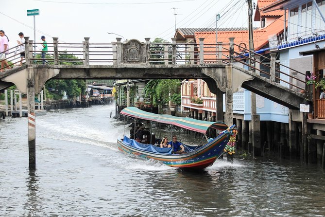 Bangkok Canal Tour by Boat and Bike - A traditional Thai puppet show in a wooden house