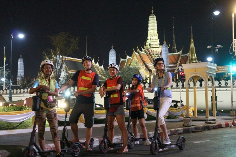Bangkok: E-Scooter Night Tour with Local Street Food - Scooter training, helmets on, and how the night stays under control