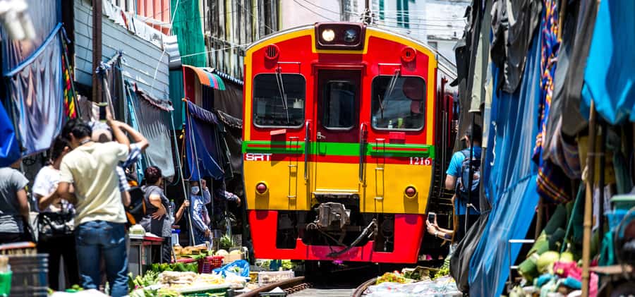 Bangkok: Floating & Maeklong Markets Tour by Private Charter - Maeklong Railway Market: shopping, photos, and staying flexible