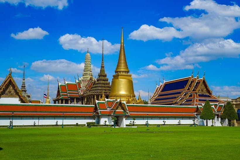 Bangkok: Grand Palace, Wat Pho, Wat Arun Sacred & Local Tour - Wat Pho Reclining Buddha: the calm after the palace shine