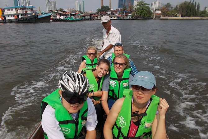 Bangkok Green Oasis 4-Hour Bike Tour with Boat Ride - Wat Khlong Toei Nok Pier to the long-boat calm
