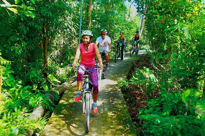 Bangkok Green Oasis 4-Hour Bike Tour with Boat Ride - The guide makes it, especially on the narrow paths