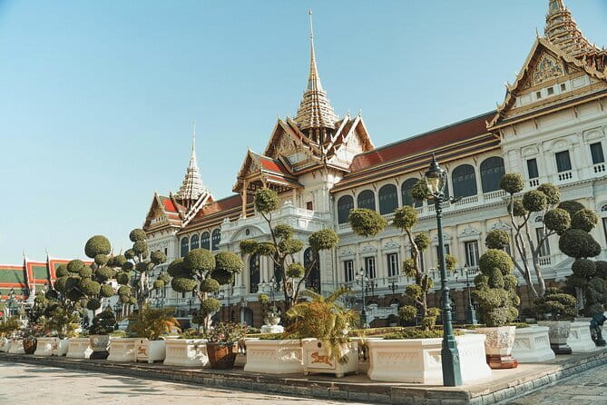 Bangkok Half Day Guided Tour: Grand Palace, Wat Arun & Wat Pho - Stop-by-stop: Grand Palace, Wat Phra Kaew, Wat Pho, Wat Arun