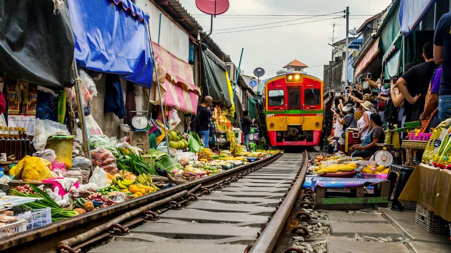 Bangkok highlight: Floating Market, Train Market & Ayutthaya - Maeklong Railway Market: the train, the stalls, and the timing