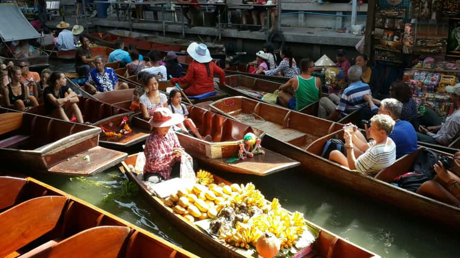 Bangkok: Maeklong Railway & Damnoen Saduak Floating Markets - Coconut grove village home visit, learning coconut sap for palm sugar