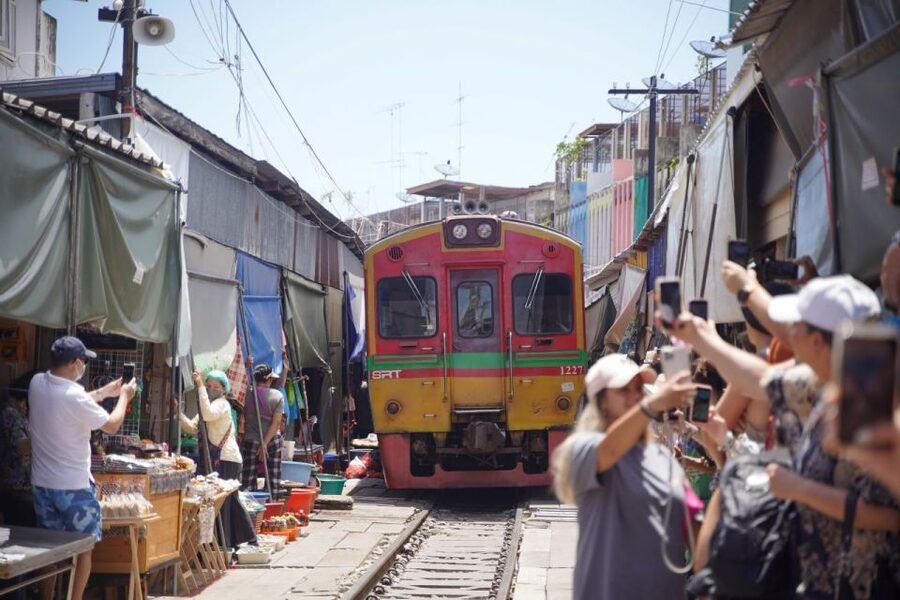 Bangkok: Maeklong Railway Market and Floating Market Tour - Photo stops and food chances at the railway market