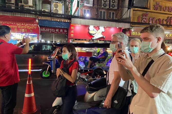 Bangkok: Michelin Guide Street Food Tour by Tuk Tuk - Entering Chinatown by tuk tuk from River City Bangkok
