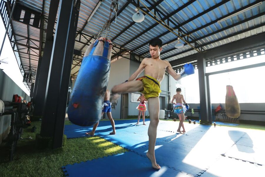 Bangkok: Muay Thai Boxing Class for Beginners - Warm-up to get you moving: stretching, jog, and core