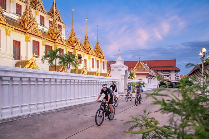Bangkok: Night Bike Tour with Temples & Flower Market Visit - Loha Prasat and the Old City Sights in Night Light