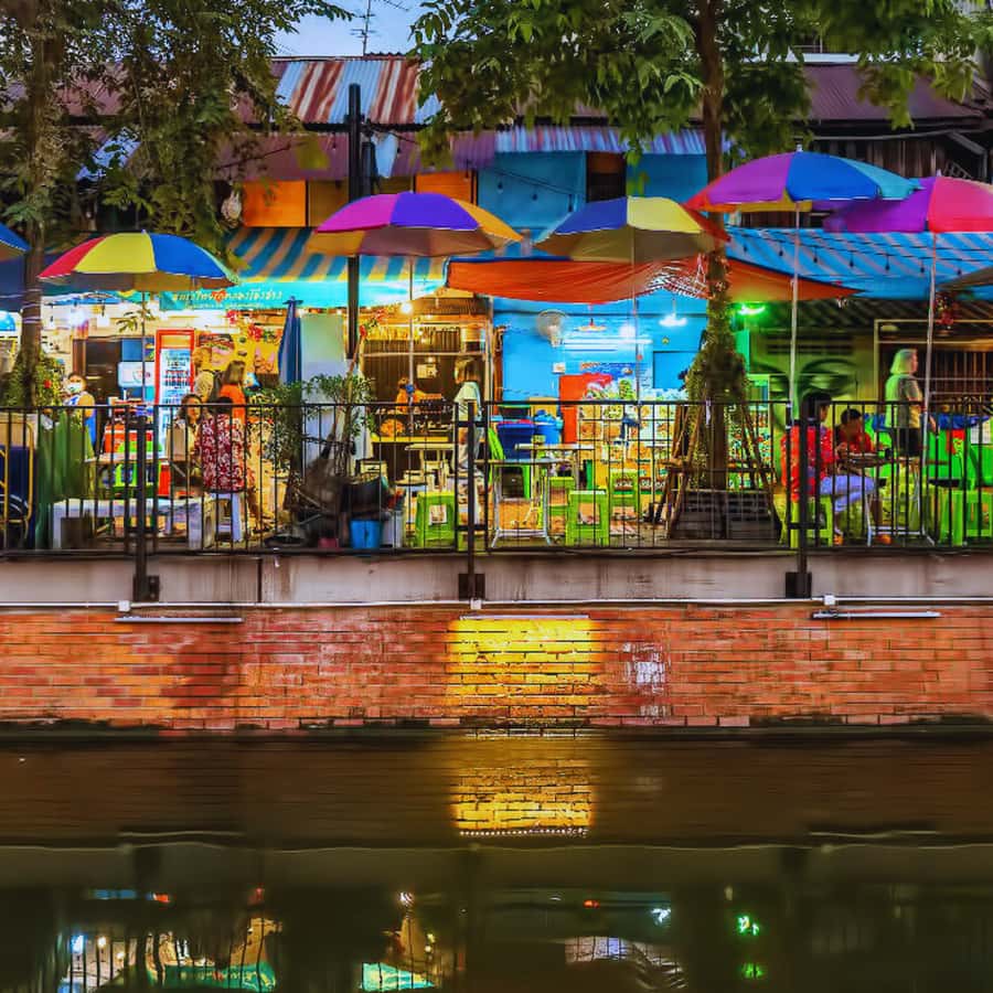 Bangkok Night Tuk Tuk: Private Tour of Markets & Landmarks - The River Crossing and a Quiet Temple Moment With a White Stupa