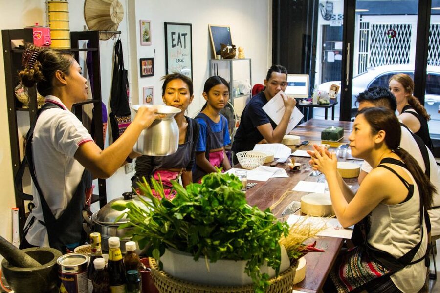 Bangkok: Thai Cooking Class and Onnuch Market Tour - Entering Onnuch Market: learning Thai flavor starts with picking