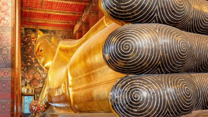Bangkok: Wat Pho and Wat Arun Guided Walking Tour - Wat Arun: The White Chedi That Looks Like It’s Made of Light