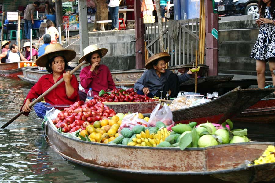 BKK :Meet monkey, mangrove forest, seafood& market -private - Maeklong Railway Market starts the day with a real show