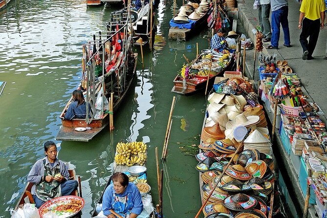 Damnoen Saduak Floating Market and Maeklong Railway Market Tour - Transportation comfort: air-conditioned van, but not a hotel limo