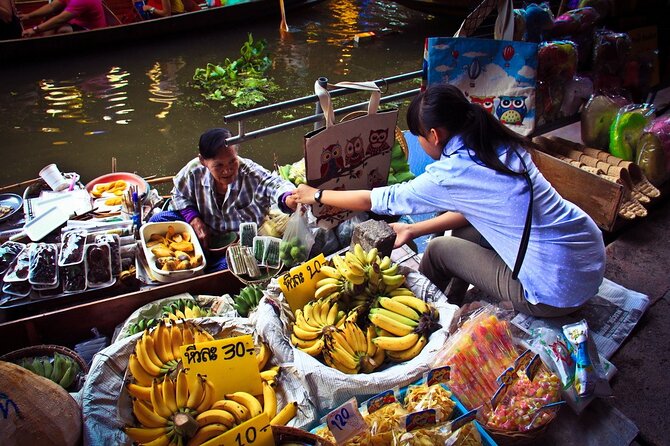 Damnoen Saduak Floating Market & Maeklong Railway Market Tour From Bangkok - English-speaking guide, small group size, and included comforts