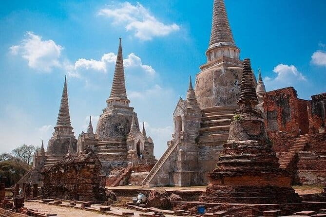 Damnoen Saduak Floating Market & Railway Market Tour from Bangkok - Included Extras That Affect Your Comfort