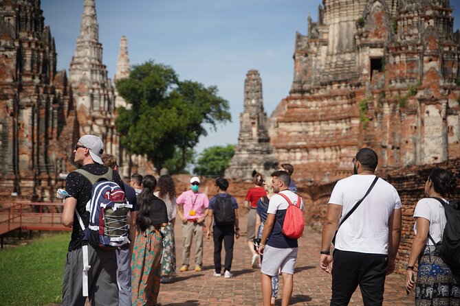 Day Tour From Bangkok to Ayutthaya By Bus - Wat Mahathat: the must-see moment, with the Buddha in the tree