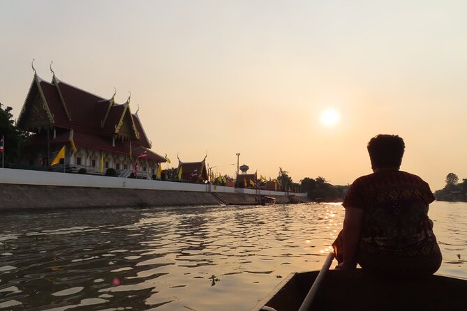 Discover Ayutthaya at Sunset: Historic Temples & River Cruise - Wat Mahathat: the Buddha head in tree roots