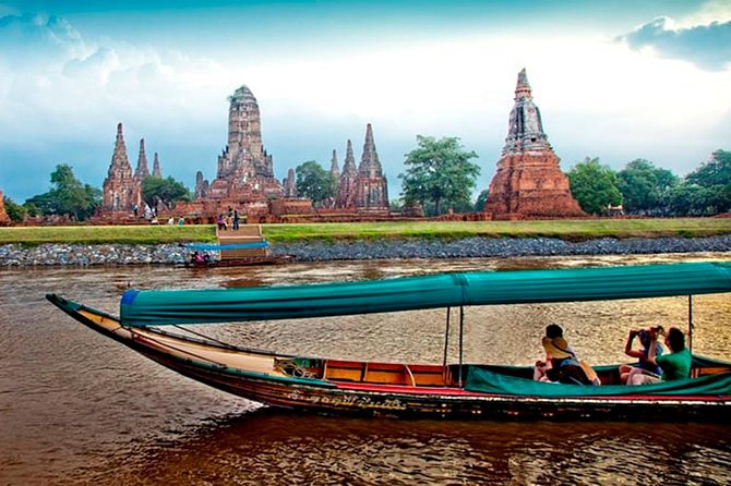 Discover Ayutthaya at Sunset: Historic Temples & River Cruise - Chao Phraya sunset boat: river views, temple passes, and evening breeze