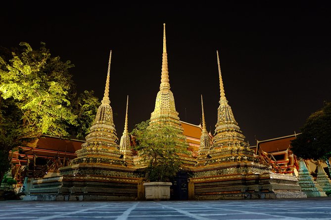 Discover Bangkok at Night 5-Hour Bike Tour with dinner - Stop 4: Wat Phra Chetuphon, Thai massage roots, and what you might miss