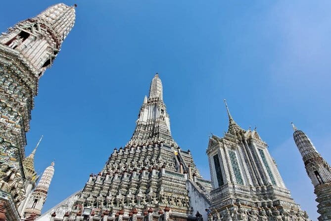 Discover Bangkok: Best Places to Visit - Tailor-Made Adventure - Wat Arun and Wat Traimit: dawn-shaped views and the Golden Buddha