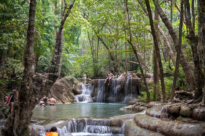 Erawan Waterfalls and Bridge Over River Kwai Tour from Bangkok - Erawan National Park: Lunch on Your Time, Then Into the Jungle