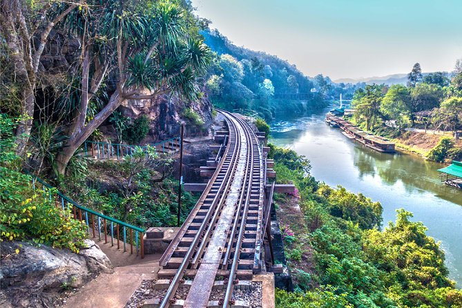 Erawan Waterfalls and Bridge Over River Kwai Tour from Bangkok - JEATH War Museum: A Short Stop With Big Emotional Weight