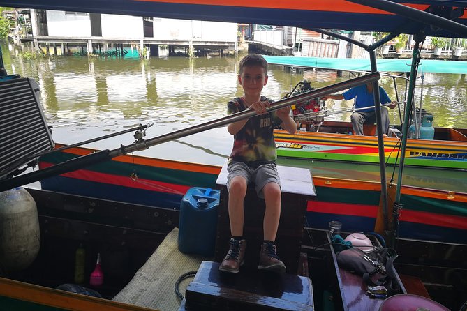 Explore Bangkok by Bike & Boat with Lunch - Wat Ko, the rooster temple, and a fish-feeding moment