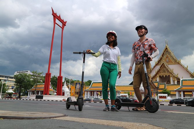 Explore Bangkok by E-Scooter & Try Street Food - Tha Din Daeng Market: pork satay with peanut sauce and real market energy