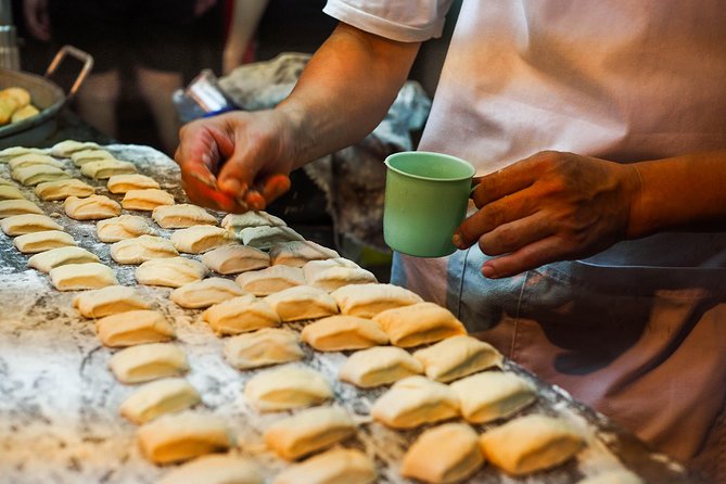 Flavors of Bangkok: Small-Group Chinatown Evening Food Tour - Stop 2 on Yaowarat Road: Noodles, Dumplings, and Street-Sweet
