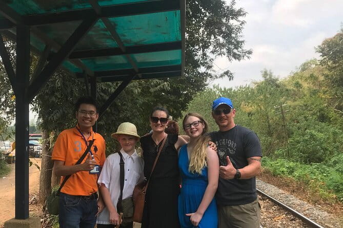 Floating and Railway Markets and Erawan Waterfall (Group Tour) - Mae Klong Railway Market (Hoop Rom Market): A Market Built Around Timing