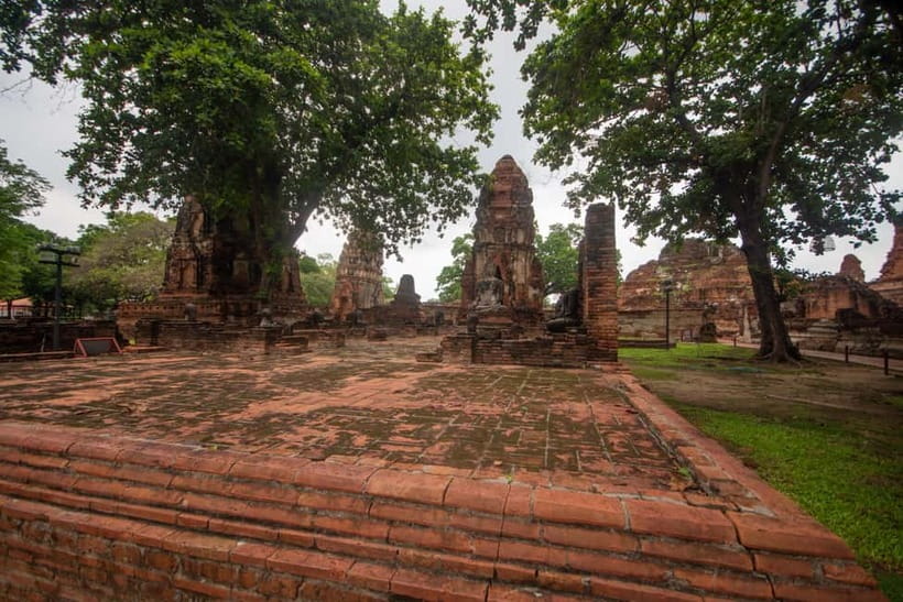 From Bangkok: Affordable Ayutthaya Highlights Tour - Wat Mahathat, the Buddha head in tree roots