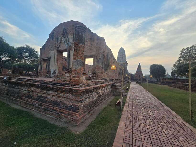 From Bangkok: Ayutthaya Afternoon Tour with Boat & Tuk-Tuk - One-hour tuk-tuk ride through illuminated ruins