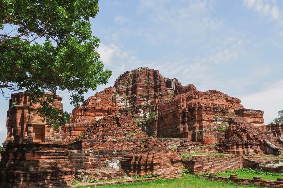 From Bangkok: Ayutthaya Day Tour by Bus with River Cruise - Wat Mahathat: The Tree-Root Buddha Head Moment