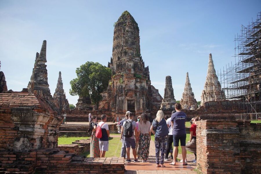 From Bangkok: Ayutthaya Historical Day Tour by Bus - Wat Maha That: the iconic Buddha head in tree roots