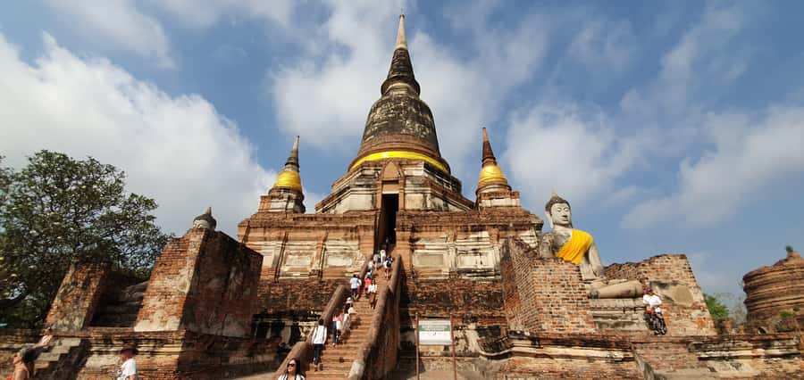 From Bangkok: Ayutthaya & Khao Yai National Park Day Trip - Wat Mahathat and the banyan tree Buddha head
