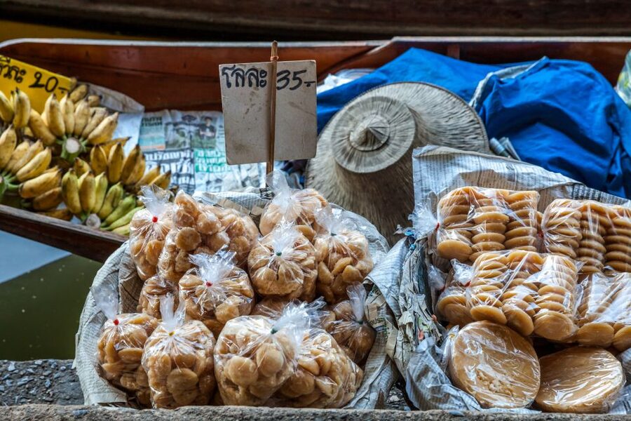 From Bangkok: Damnoen Saduak Floating Market Guided Tour - Bangkok pickup and the van ride to Ratchaburi