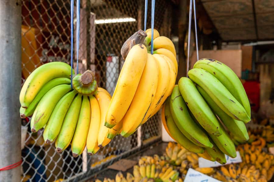 From Bangkok: Maeklong Railway and Floating Market Food Tour - The extra stop you might get: coconut farm and coconut sugar