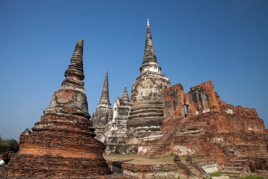 From Bangkok: Private Tour to Ayutthaya & Summer Palace - Wat Phu Khao Thong: the warm-up before the big ruins