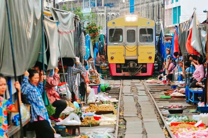 Glittering Ayutthaya Tour to Famous Sights, Market & Sunset Boat - Temples and Landmarks You Pass by Boat: More Places, Less Walking
