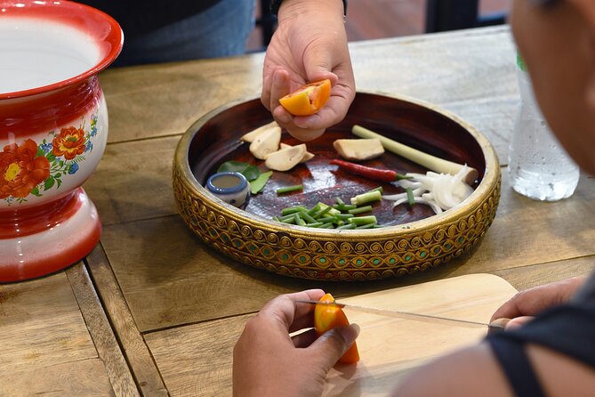 Hands-on Thai Cooking Class & Market Tour in Sukhumvit - Morning market tour versus afternoon fruit carving