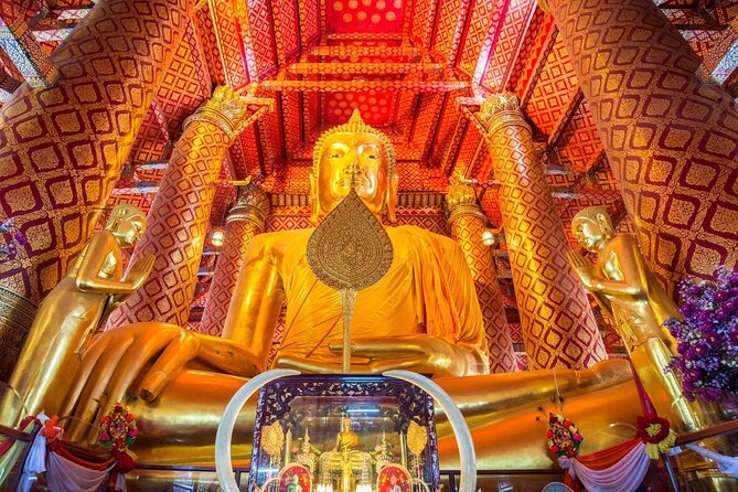 Lopburi Monkey Temple & Ayutthaya Old City Tour From Bangkok - Wat Mahathat: the famous Buddha head in tree roots
