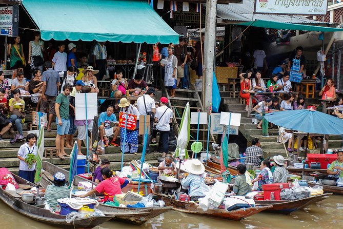 Maeklong & Damnoen Saduak Markets: Railway & Floating Market Tour - Damnoen Saduak Floating Market: Boat Traffic, Loud Energy, and Good Bargain Fun